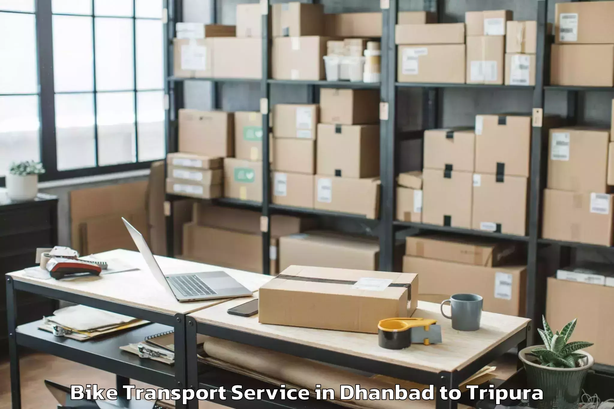 Top Dhanbad to Kailashahar Airport Ixh Bike Transport Available